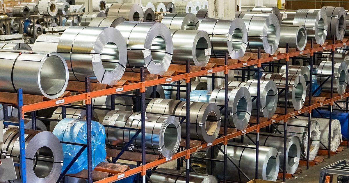 Coiled steel stock in a warehouse